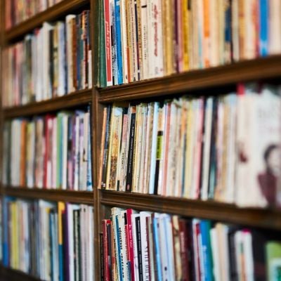 Books on a wooden shelf