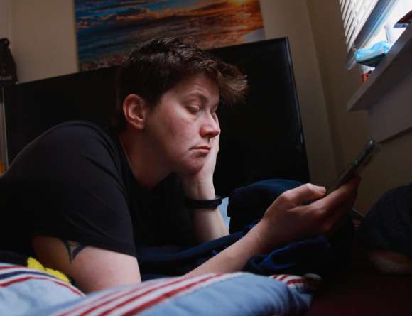 Lonely individual with mobile phone