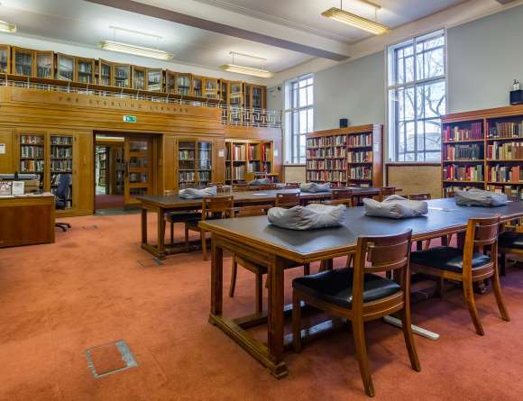Senate House Library's Special Collections reading room with a view into the Sterling Library.