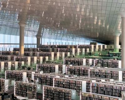 Library with lots of books stacked up
