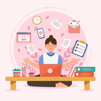Person sitting in front of a desk with lots of office icons surrounding her