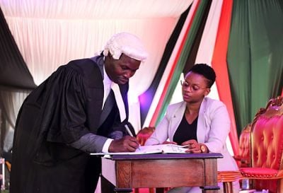William Okumu being admitted to the bar