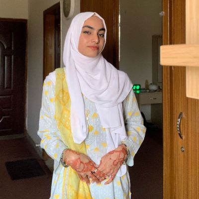Syeda wearing native clothing