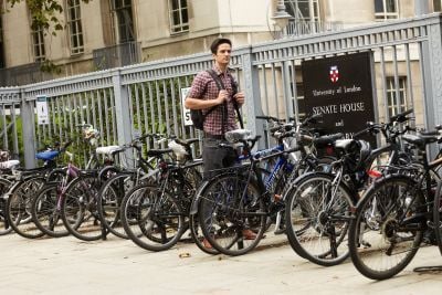 Male student at bike rack