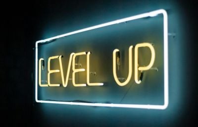 Yellow and white level up LED lights photo – Free Neon Image on Unsplash
